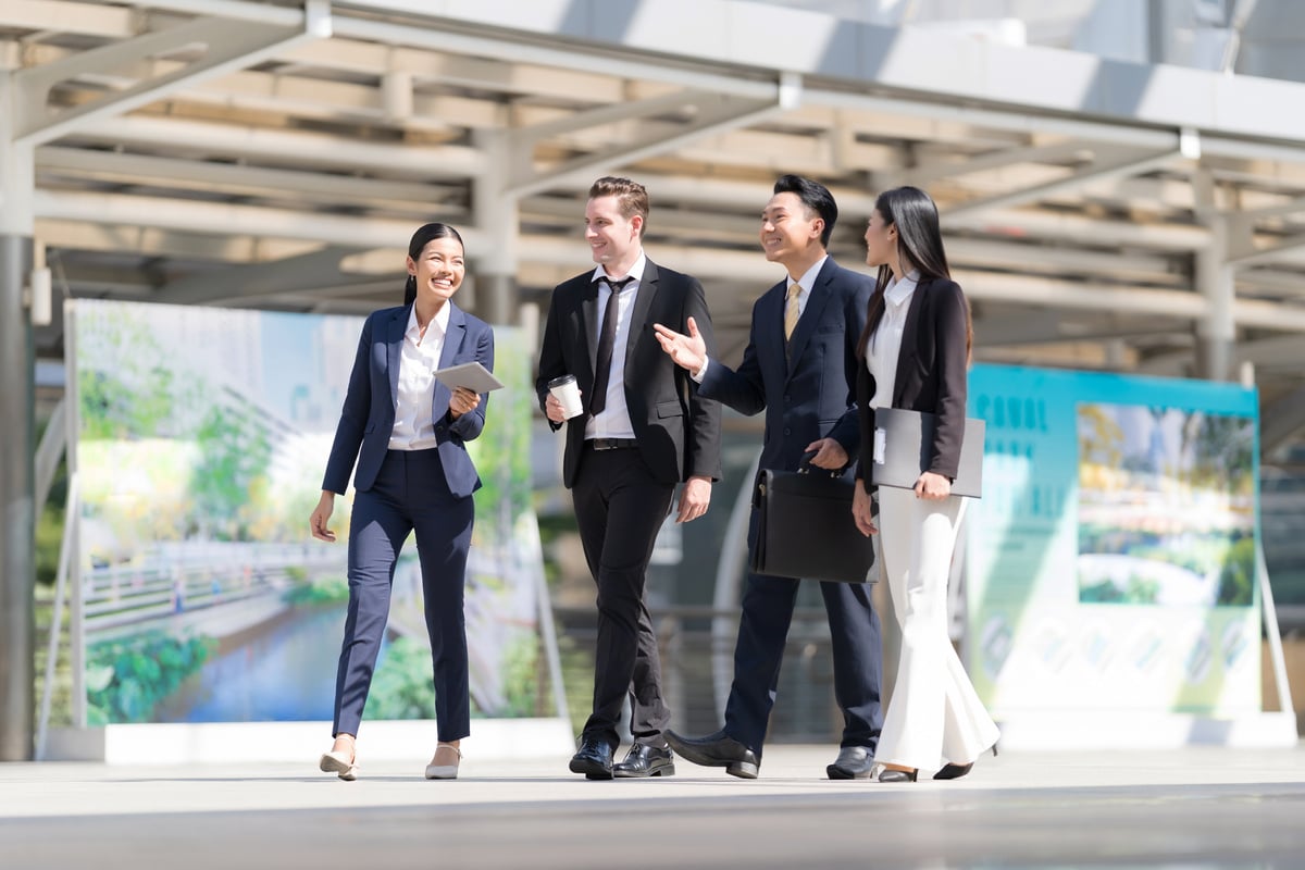 Business People Walking and Talk to Each Other